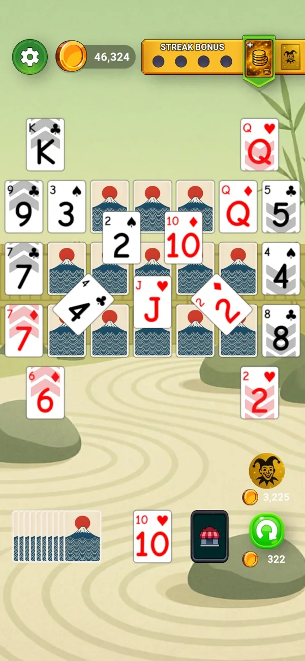 An overlapping TriPeaks card layout on a wooden board in Infinity Solitaire.