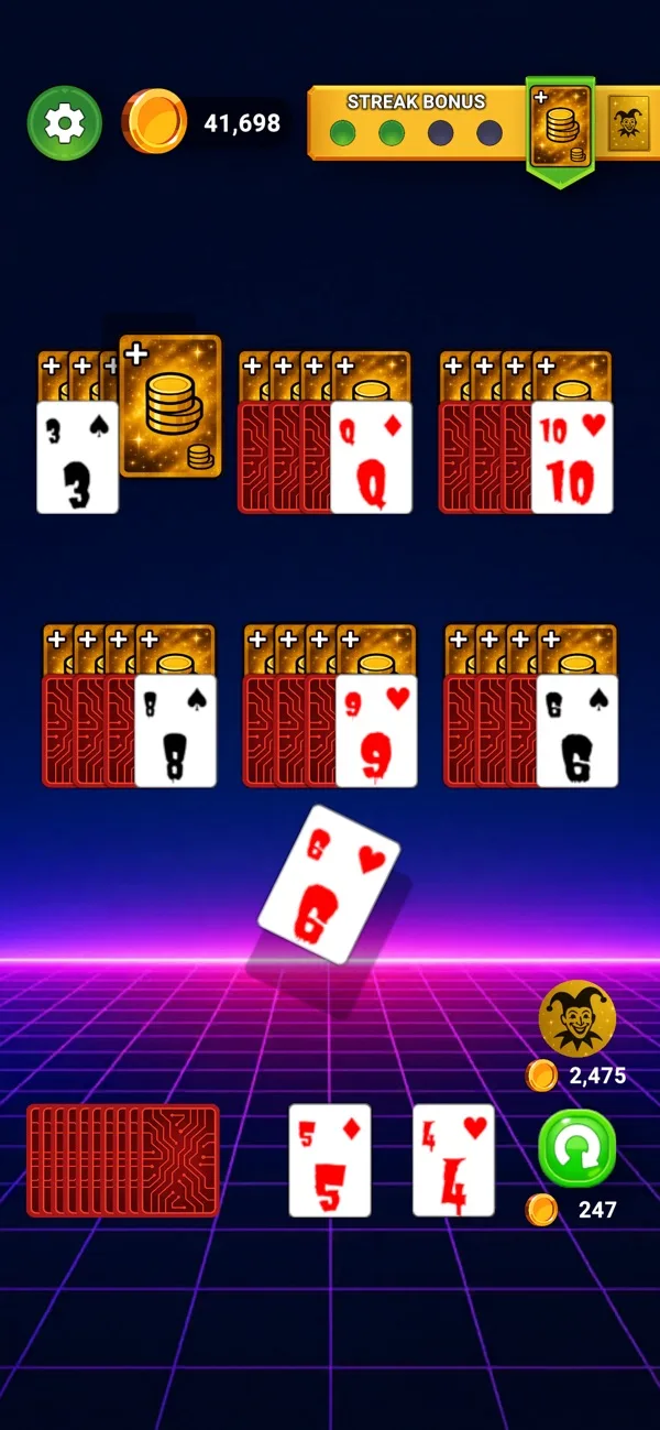 Red and gold card backs on a glowing neon board in Infinity Solitaire.