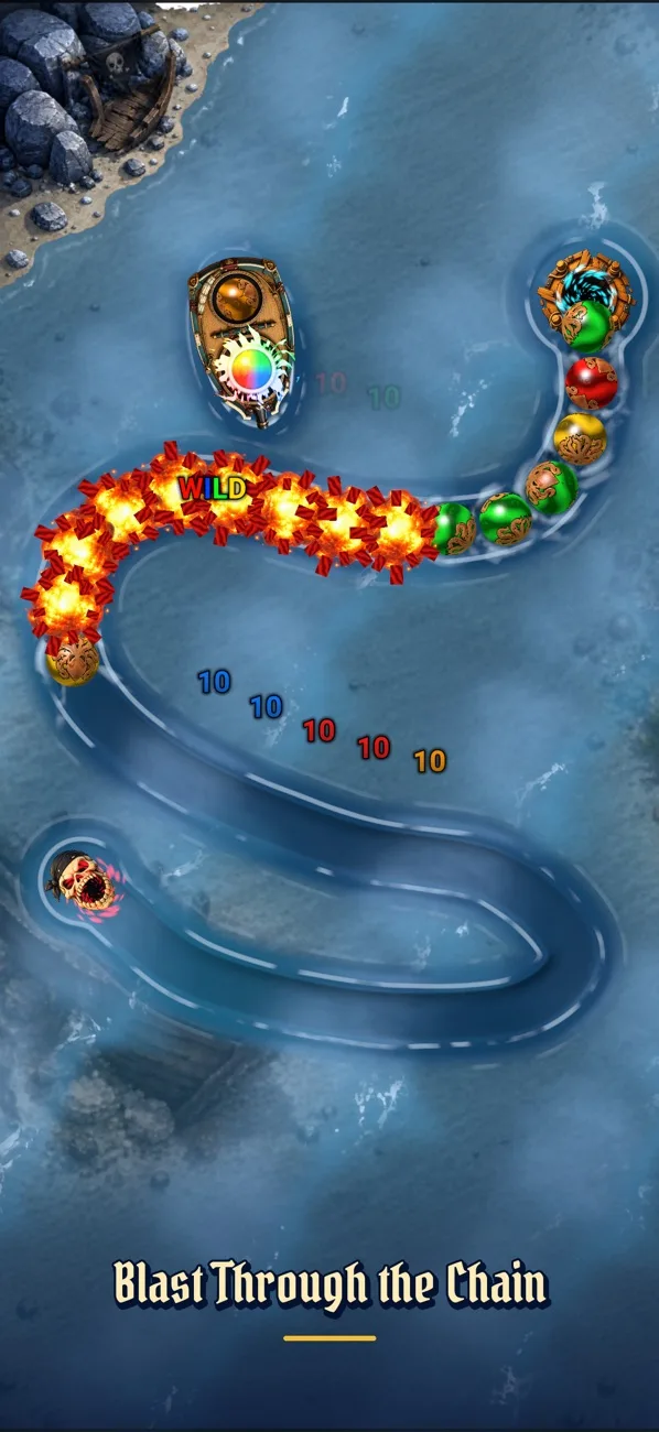 A fiery blast clears part of a marble chain in Sea of Marbles.
